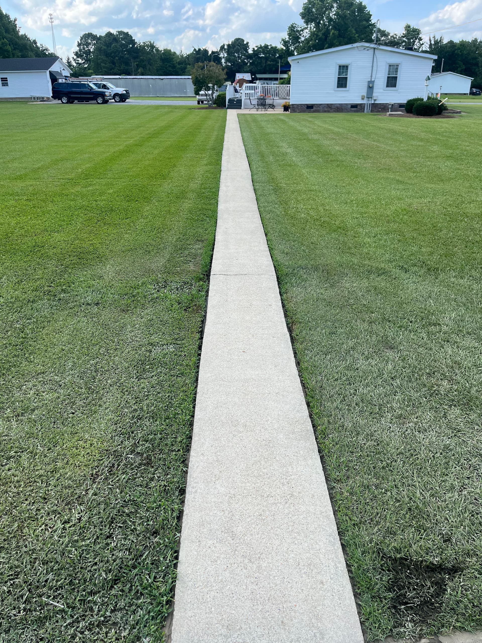 Gallery photos for Driveway Pressure Washing Before and After in Elm City NC: Image #1