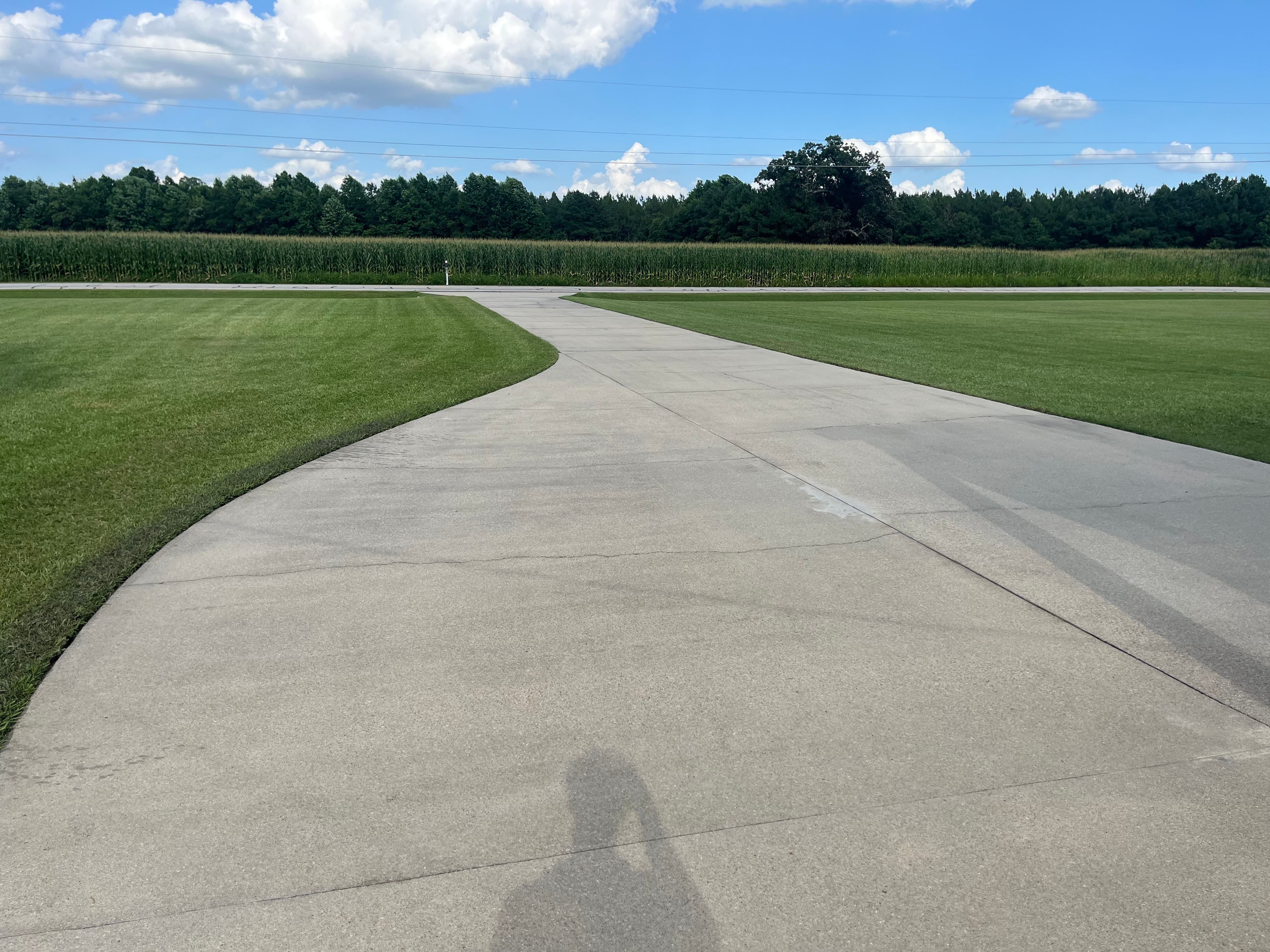 Project Driveway Pressure Washing Before and After in Elm City NC image