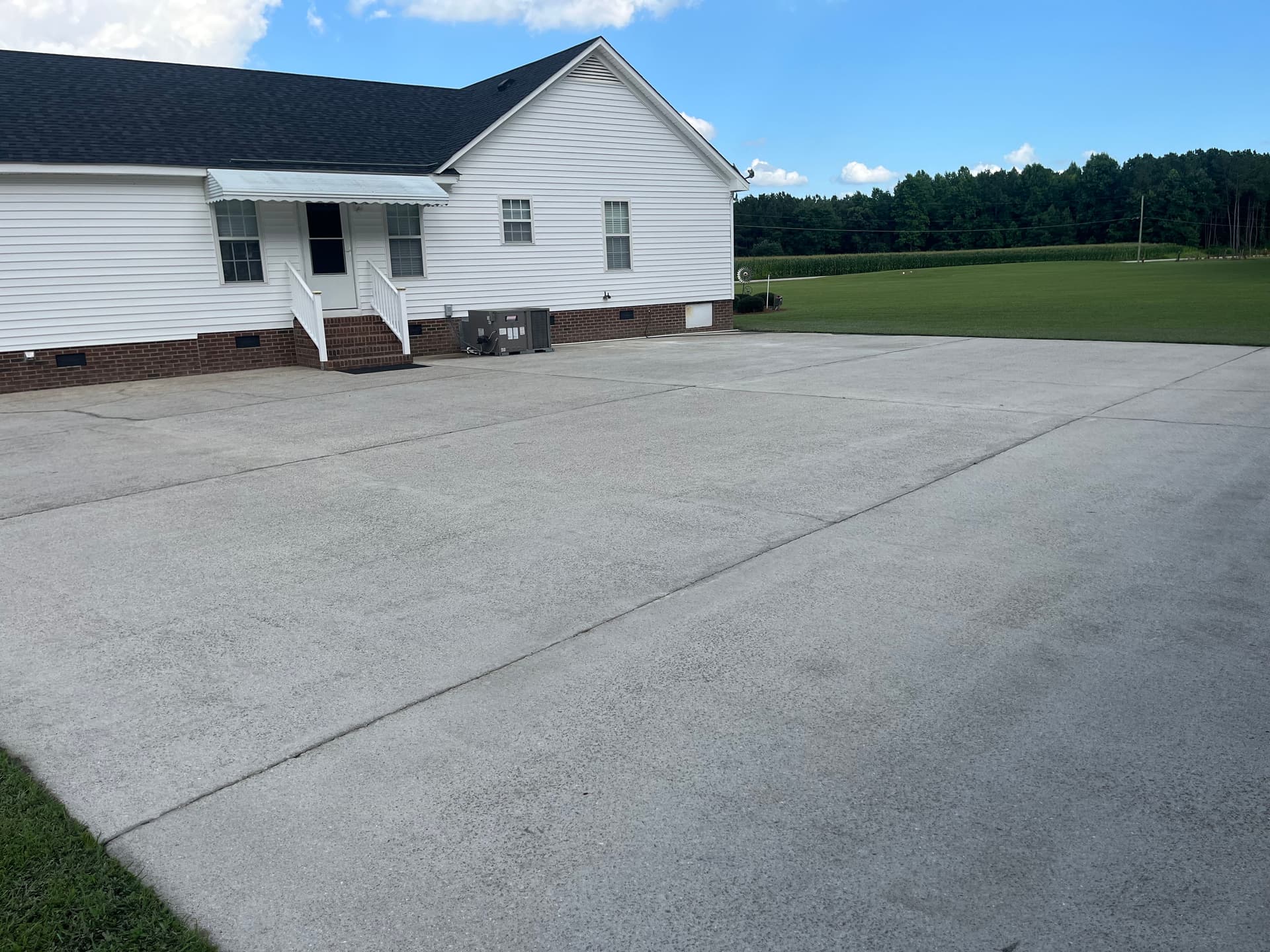 Gallery photos for Driveway Pressure Washing Before and After in Elm City NC: Image #2