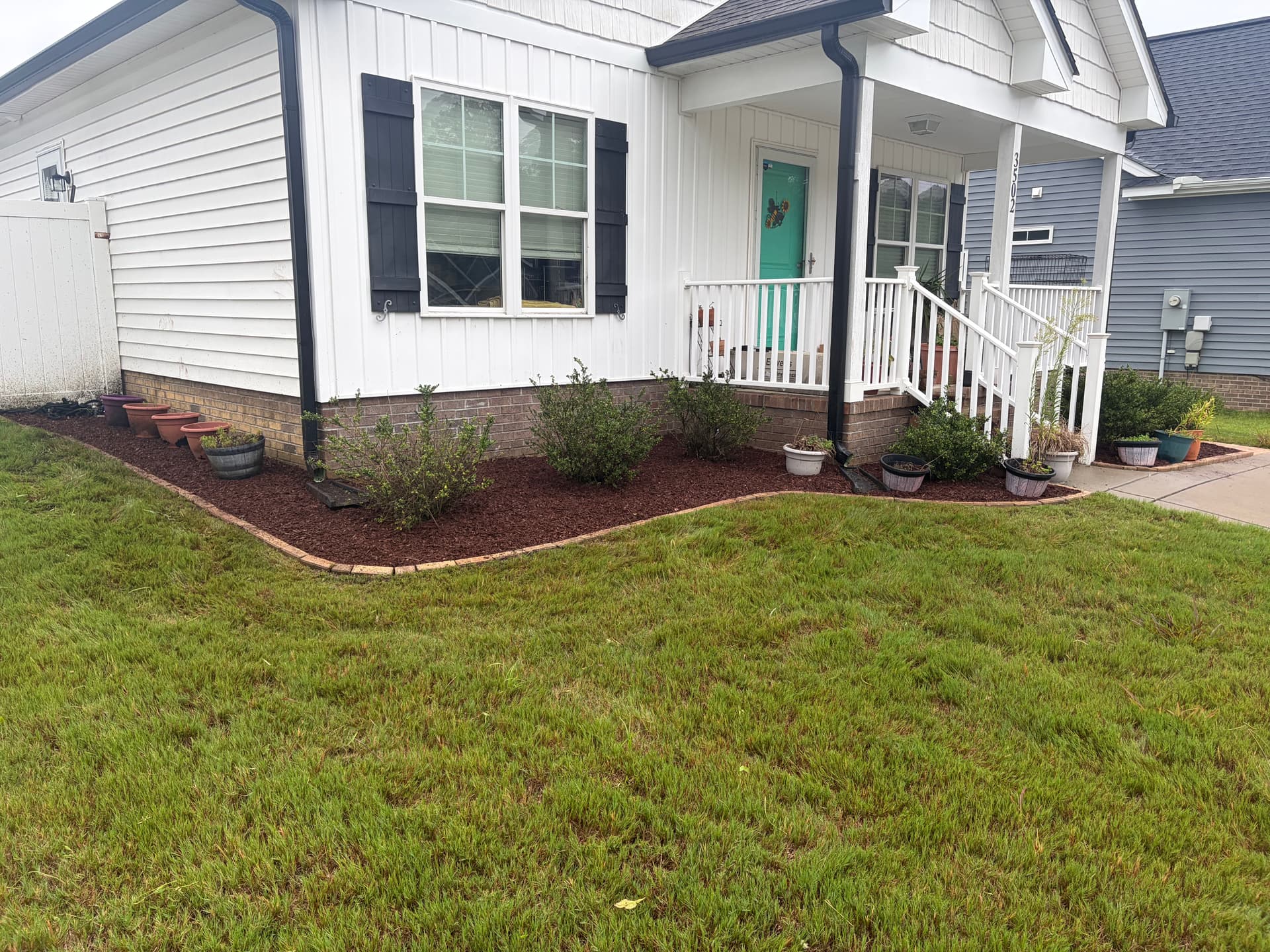 Fresh Brown Mulch Install That Actually Does Its Job image