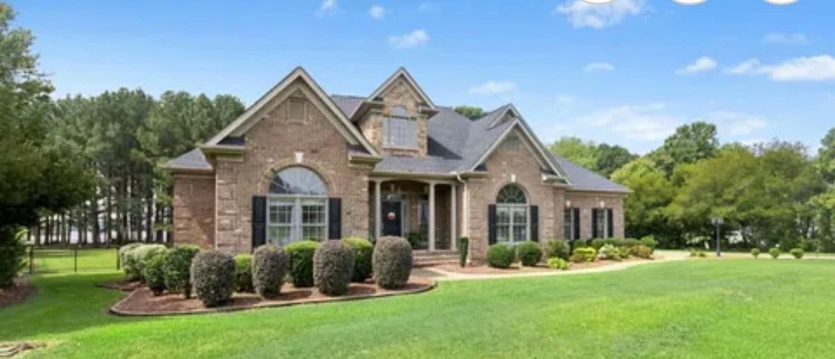 Full Property Cleanup Front to Back on a Brick Home image